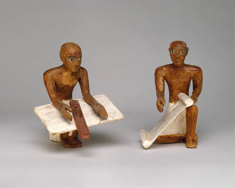 Little scribes, ready to write down every sack, from a model granary in the tomb of Meketre (about 1980 BC).