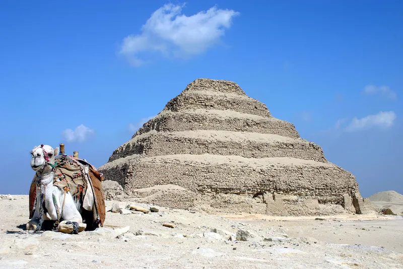 The Step Pyramid of King Djoser at Saqqara, the first pyramid.