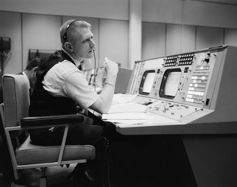Flight director Gene Kranz at his console in Mission Control.