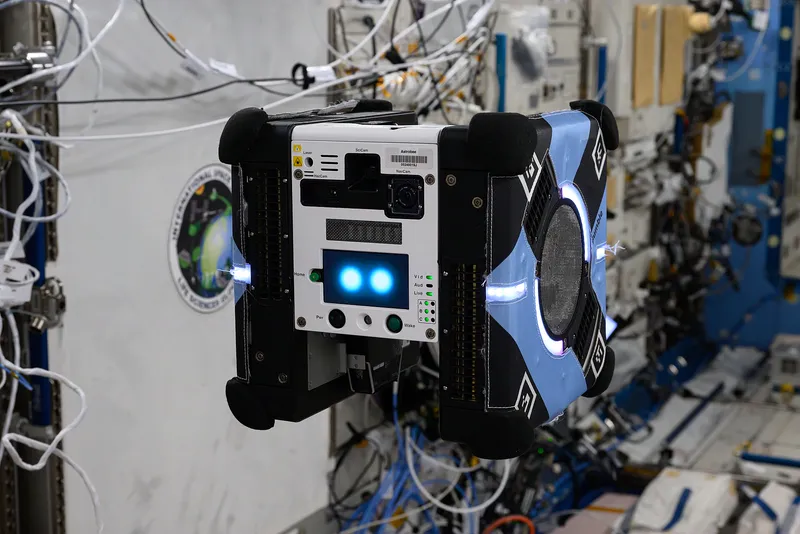 A free-flying Astrobee robot helper aboard the International Space Station.