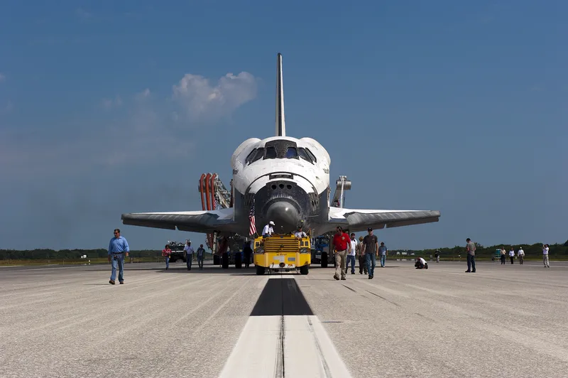 The Space Shuttle Atlantis being towed after its final landing in 2011.