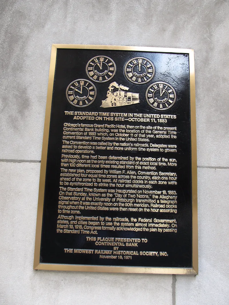 A plaque marking where railway officials adopted standard time zones in the United States in 1883.