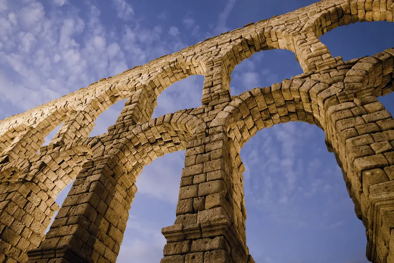 The aqueduct of Segovia, Spain, is built of granite blocks fitted together without mortar.